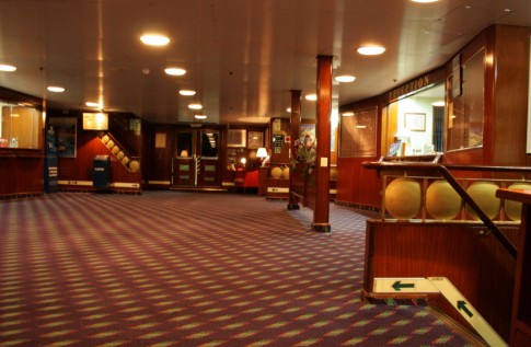 The main lobby is centrally located on Deck 5 (originally A Deck) which is otherwise given over to cabins.