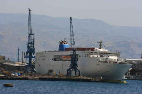 Corsica Ferries' troubled Mega Express Five at the Palumbo shipyards, Messina. With the shipyard seemingly incapable of finishing the conversion, the ship was later towed to Genoa for completion.