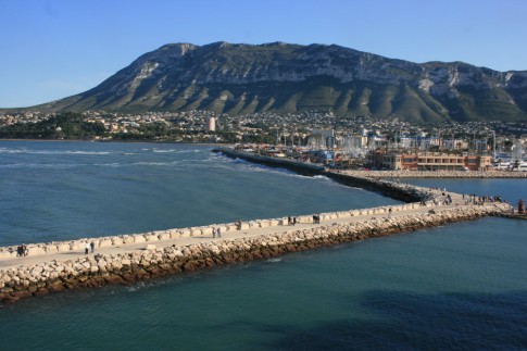Denia's Southern breakwater with MontgÃ³ looming in the background.