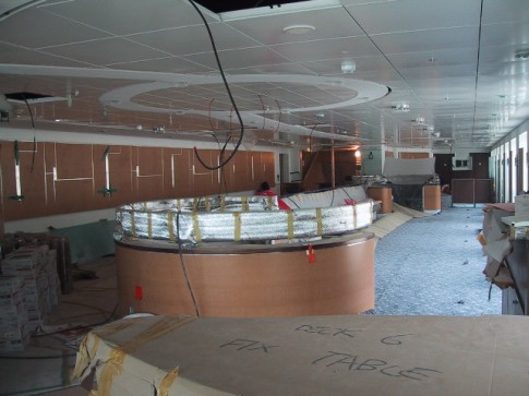 Heading aft on the port side, there is further cafeteria seating (July 2005).