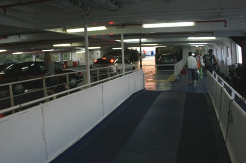 Foot passengers disembarking by the stairs aft, accessed via the upper vehicle deck. 
