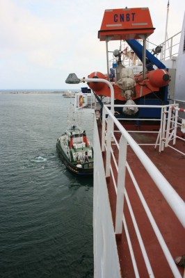 Tug assistance to move off the berth.