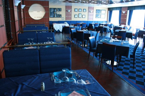 On the opposite side of the ship to the pizzeria is the small formal restaurant - what was the 'Time Out Restaurant' on the 'Wonder' and 'Freedom' (as pictured) became the 'Grand Prix Restaurant' on the Moby Aki but the decor was little changed. 