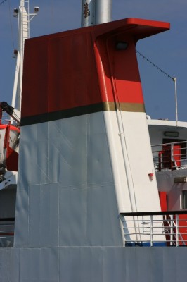 A close look at the ship's funnel reveals the painted-over original Brittany Ferries' markings. 