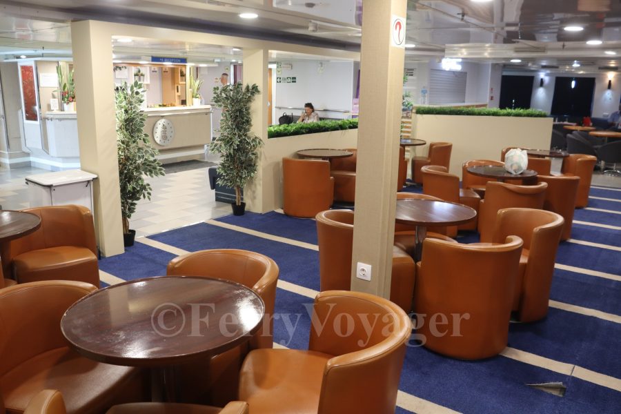 New amidships lounge area created from the aft part of the former free flow cafeteria.