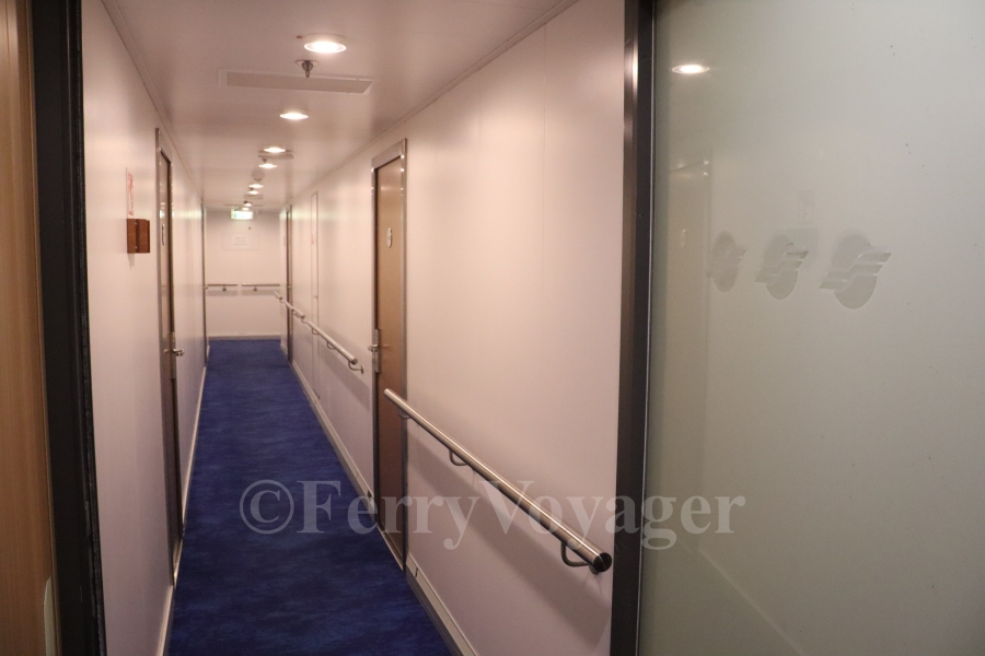 The former spa has also been converted into cabins, but the original entrance door to the spa still bears Superfast logos. A variety of smaller signs with Greek language can still be found elsewhere on the ship.