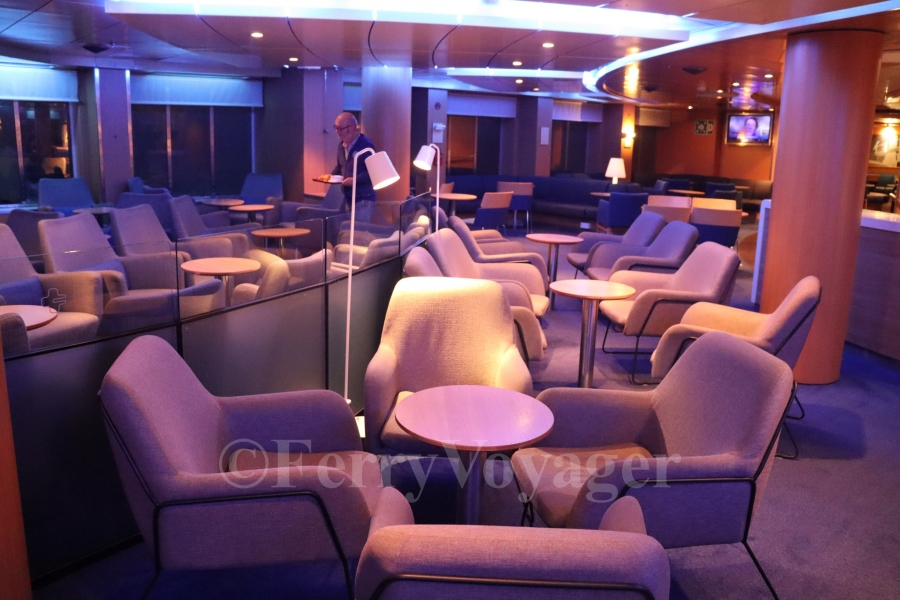 The bright lounge assumes a different atmosphere at night, with intimate lighting.